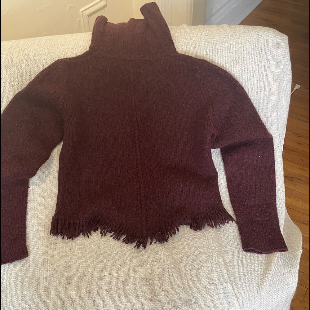 Turtleneck sweater with fringe